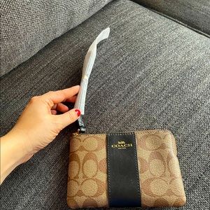NWT coach wristlet! Received it as a gift for Christmas. Never used. Brand new!